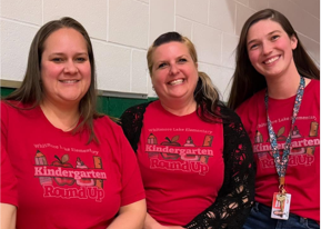WLPS teachers posing together in Trojan red