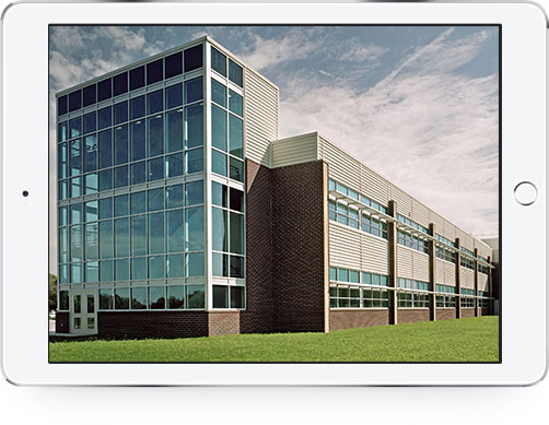 Color image of the current Whitmore Lake High School building.